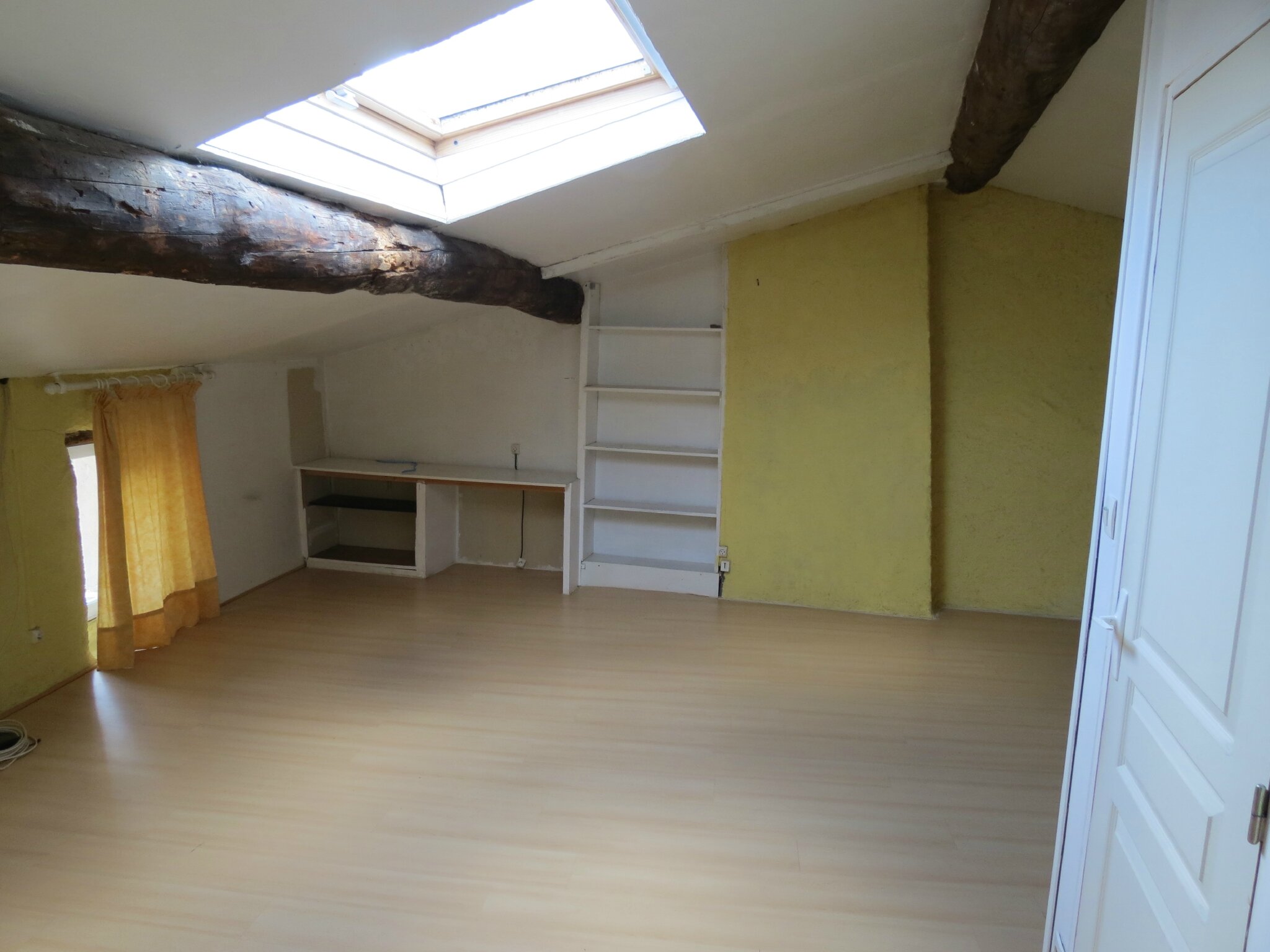 Combles aménagés présentation maison de ville à saint rambert (42)