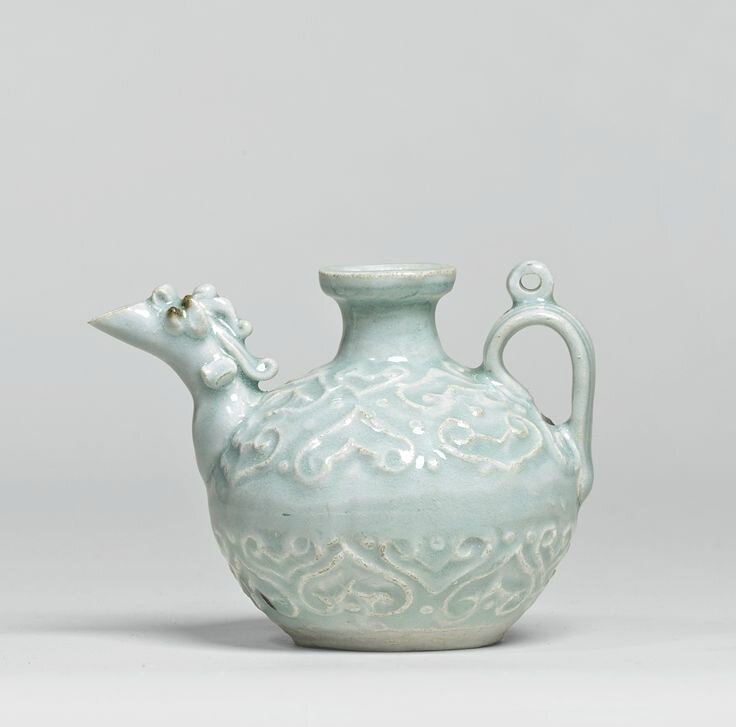 A rare 'Qingbai' carved ewer, Yuan dynasty