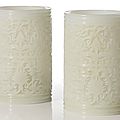 A pair of white glass 'lotus' brush pots, Late Qing dynasty