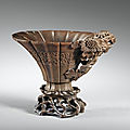 A carved rhinoceros horn 'chrysanthemum' libation cup, China, Qing dynasty, 17th-18th century
