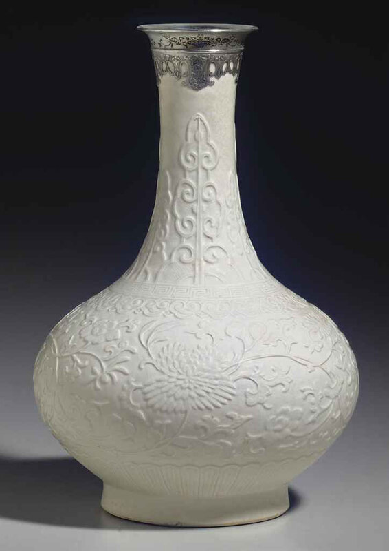 2011_NYR_02427_1754_000(a_white-glazed_relief-decorated_soft-paste_bottle_vase_18th_century)