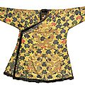 An imperial yellow satin brocade tibetan -style 'dragon' robe (chuba), qing dynasty, kangxi period