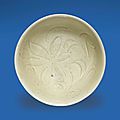 A small carved Ding bowl, Northern Song dynasty, 12th century