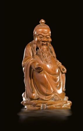 A_carved_boxwood_figure_of_a_seated_Daoist