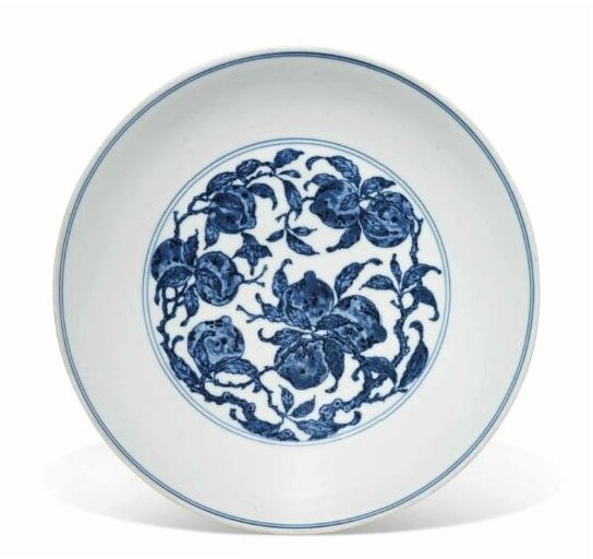 A blue and white 'Nine peaches' dish, Qianlong six-character seal mark in underglaze blue and of the period (1736-1795)