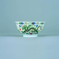 A chinese imperial porcelain wucai dragon and phoenix bowl. six character sealmark of jiaqing and of the period, 1796-1820.