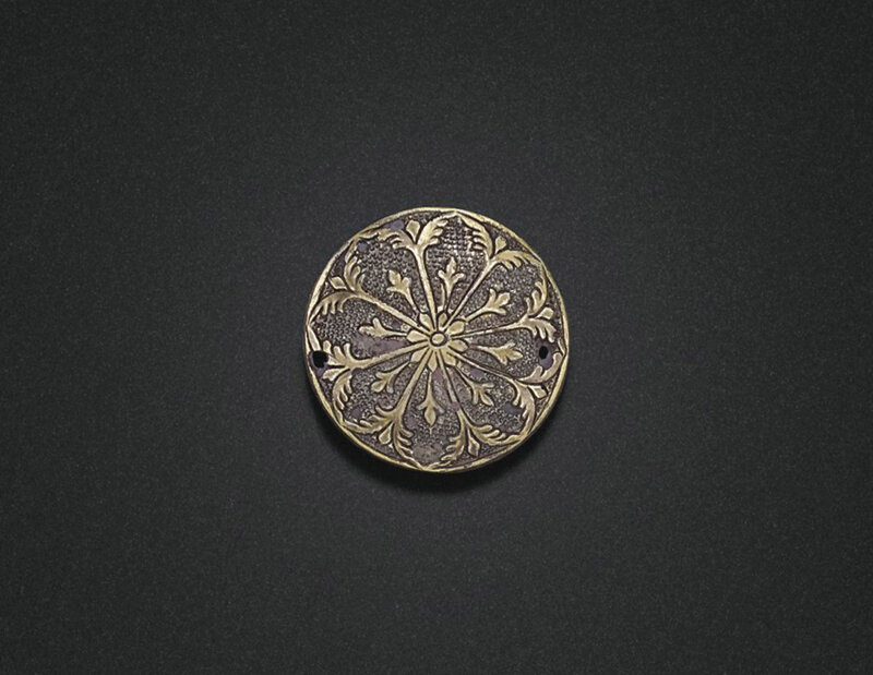 A miniature circular parcel-gilt silver box and cover, Tang dynasty (618-907)