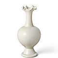 A ding white-glazed foliate-rim vase, song dynasty (ad 960-1279)