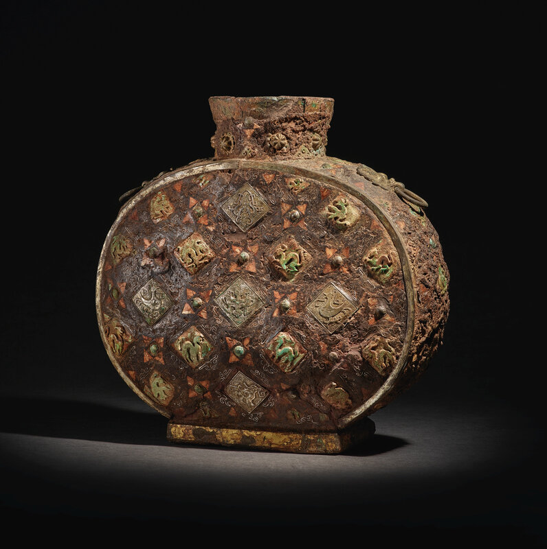 An important and extremely rare inlaid iron flask, Warring States