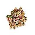 18 karat gold and colored stone 'leaf' brooch. verdura, circa 1940