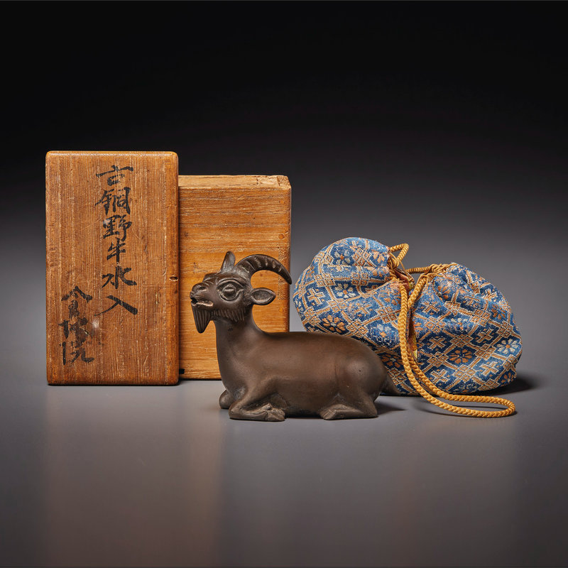 2021_NYR_19547_0739_000(a_small_bronze_recumbent_goat-form_water_dropper_ming-qing_dynasty012734)