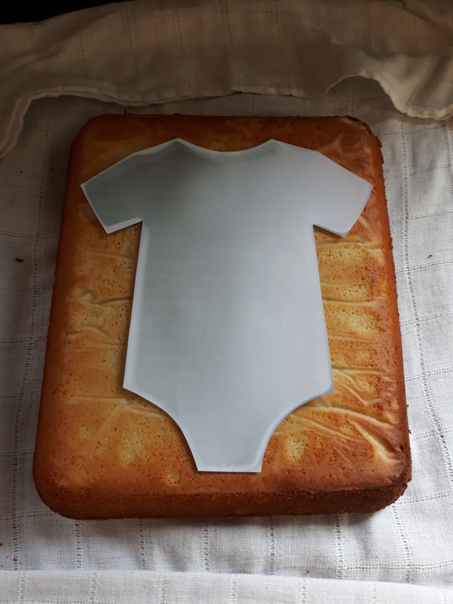 Un gâteau en forme de bébé