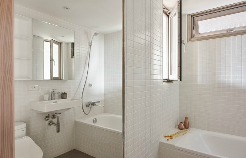 bright-white-tiled-bathroom