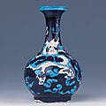 A very rare imperial Fahua bottle vase, Encircled Zhengde four-character mark and of the period (1506-1521)