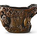 A massive inscribed rhinoceros horn ‘Pine Tree’ libation cup, 17th century