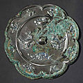 A silvered grey bronze eight lobered mirror, Tang dynasty (618-907)