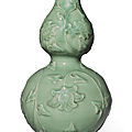 An exceptionally rare 'longquan' celadon-glazed double-gourd 'peony' vase, yuan dynasty (1279-1368)