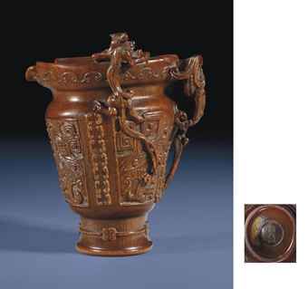 a_rare_and_finely_carved_rhinoceros_horn_pouring_vessel_17th_century_x_d5492030h