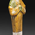A sancai-glazed pottery figure of a court lady, Tang dynasty (AD 618-907)