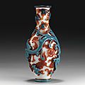 A red and blue overlay glass bottle vase. Qianlong mark, probably of the period. photo courtesy Sotheby's
