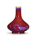 A rare small flambé-glazed pear-shaped vase, qianlong incised six-character seal mark and of the period (1736-1795)
