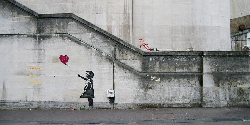1280px-Banksy_Girl_and_Heart_Balloon_(2840632113)