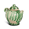 A small green-splashed pottery ewer and cover, Tang dynasty