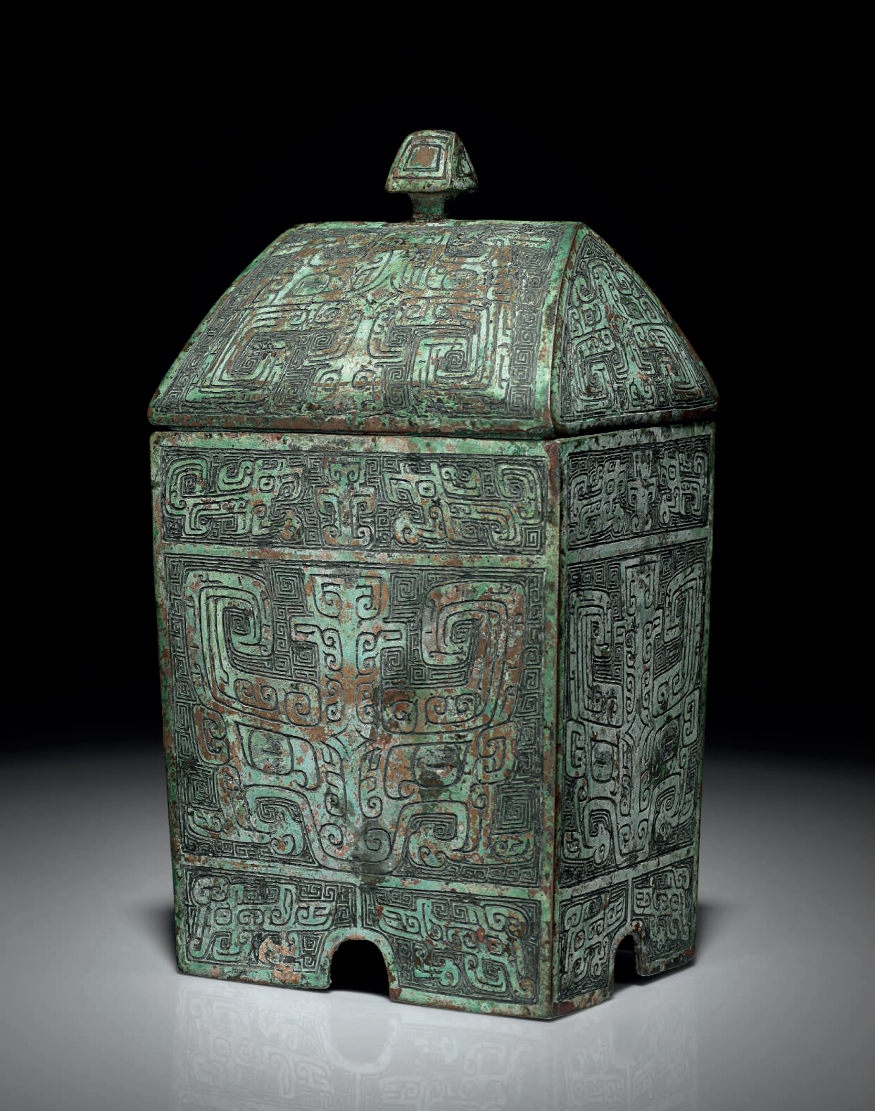 A very rare bronze ritual rectangular wine vessel and cover, fangyi, late Shang dynasty, 13th-11th century