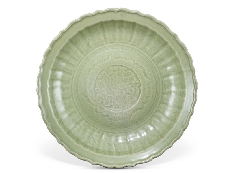 A Longquan celadon barbed 'peony' charger, Yuan-early Ming dynasty
