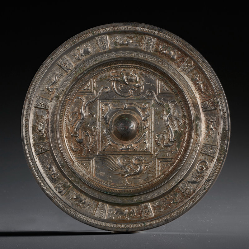 A silvery bronze circular mirror, Sui-Early Tang dynasty 6th-7th century