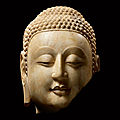 A superbly carved rare marble fragmentary head of shakyamuni buddha, northern qi dynasty (550-577)