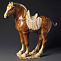 A large sancai-glazed pottery figure of a horse, Tang dynasty (AD 618-907)