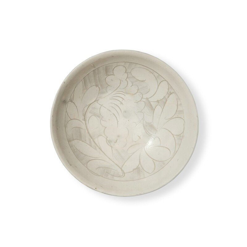 A carved 'Cizhou' 'floral' bowl, Northern Song dynasty