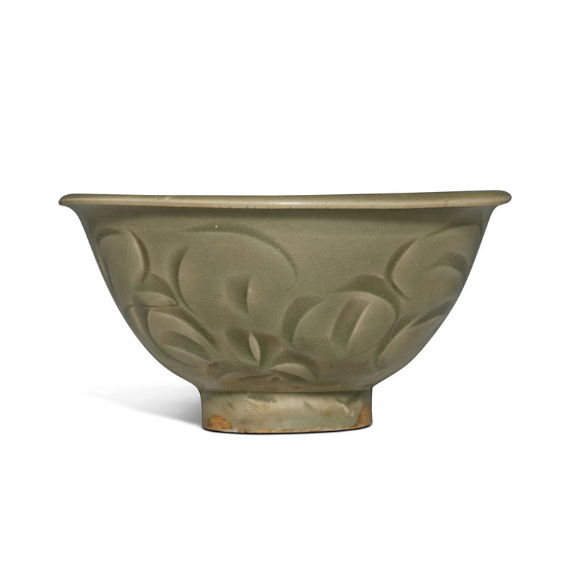 A carved 'Yaozhou' celadon-glazed 'floral' bowl, Northern Song dynasty