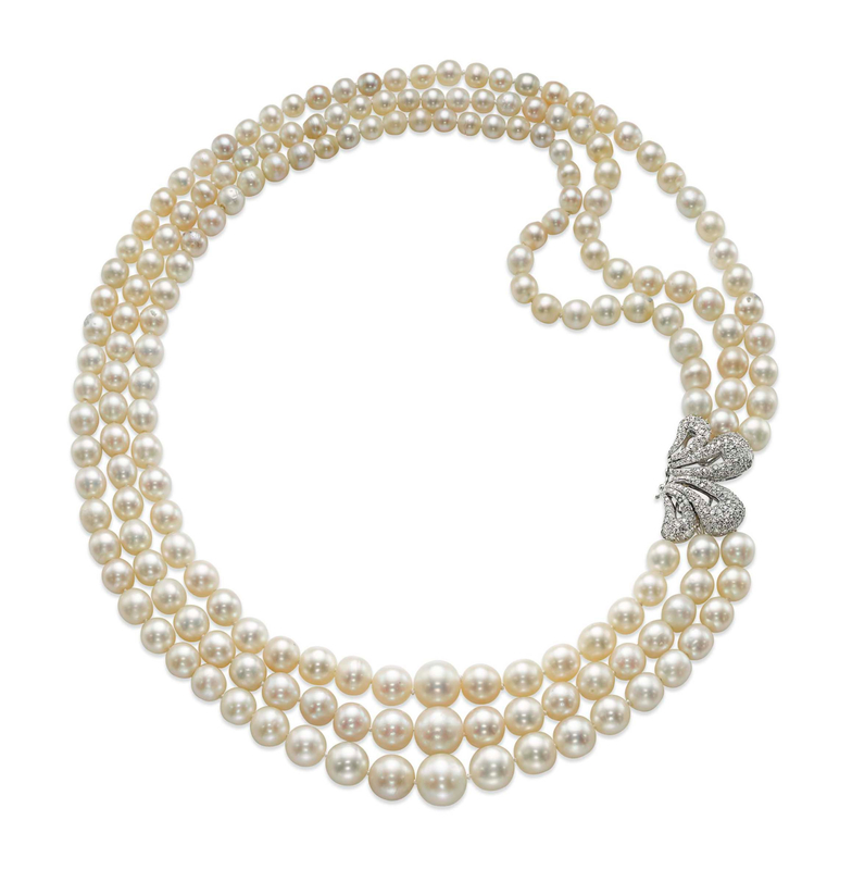 A THREE-STRAND NATURAL PEARL, CULTURED PEARL AND DIAMOND NECKLACE