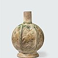 A crackle glazed wine bottle with polychrome enamel decoration, Bát Tràng kilns,16th-17th century