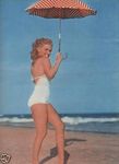 1949_tobey_beach_by_dedienes_umbrella_red_043_1