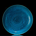 A large turquoise-glazed porcelain plate, 17th century