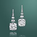 A pair of impressive diamond ear pendants