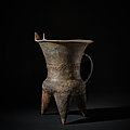 A rare archaic gray pottery tripod wine vessel (gui), early shang dynasty, erlitou culture