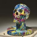Damien Hirst (b. 1965) Happy Head with Base No. 4; signed 'Damien Hirst' (lower edge), gloss household paint on resin skull and wooden base, 10 x 8¾ x 8¾ in. (25.4 x 22.2 x 22.2 cm.). Executed in 2007. This is a unique work from a series of ten.
