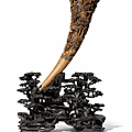 A large full-tip rhinoceros horn 'landscape and immortals' libation cup, 19th century