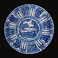 A magnificent large safavid blue and white dish depicting adam, persia, 17th century 