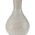 A carved Qingbai 'lotus' vase, Jin dynasty