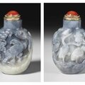 A well-carved grey and white jade snuff bottle, 1750-1850