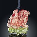 A green and pink tourmaline 'qilin and bat' pendant, 19th century