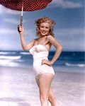 1949_tobey_beach_by_dedienes_umbrella_red_044_2