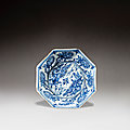 A small blue and white octagonal ‘dragon and phoenix’ dish, mark and period of jiajing (1522-1566)