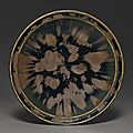 A very rare russet-splashed black-glazed dish, northern song-jin dynasty, 11th-12th century