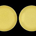 A pair of yellow-glazed 'dragon' saucer-dishes, tongzhi six-character marks and of the period